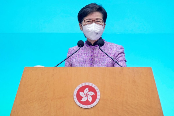 Hong Kong Chief Executive Carrie Lam listens to a reporter's questions during a news conference in Hong Kong, China April 4, 2022. Vincent Yu/Pool via REUTERS