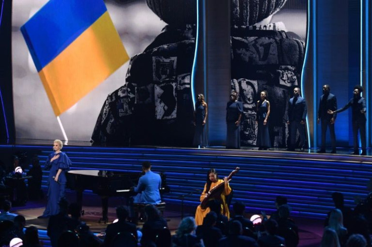 US singer-songwriter John Legend (C) performed "Free" at the Grammys; he was joined by Ukrainian singer Mika Newton, musician Siuzanna Iglidan and poet Lyuba Yakimchuk