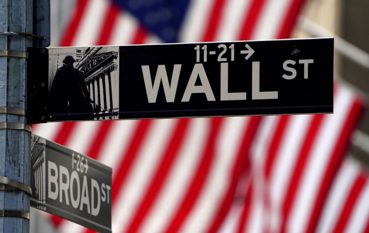 A Wall Street sign is pictured outside the New York Stock Exchange amid the coronavirus disease (COVID-19) pandemic in the Manhattan borough of New York City, New York, U.S., April 16, 2021. 