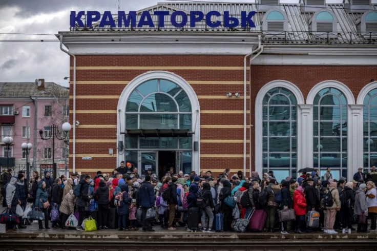 Almost 2,000 people a day board trains west for Lviv or elsewhere, a volunteer says in Ukrainian-controlled territory in Donbas