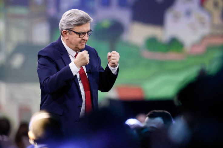 Jean-Luc Melenchon, leader of far-left opposition La France Insoumise (France Unbowed - LFI) political party and candidate for the 2022 French presidential election, gestures as holds a L'Union populaire (popular union) political campaign meeting, an "imm