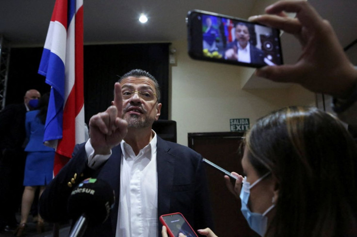 Costa Rica's president-elect Rodrigo Chaves speaks to reporters following a news conference where he said his government will improve a financial assistance program agreed with the International Monetary Fund (IMF), in San Jose, Costa Rica April 4, 2022.