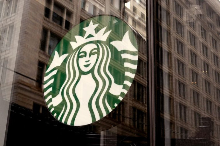 Starbucks will suspend its share repurchase program, which is popular with investors but has been a lightning rod for criticism from union backers