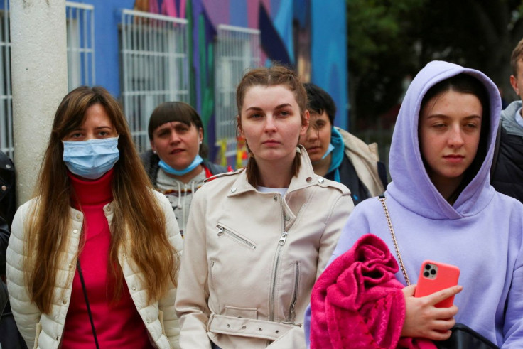 Ukrainians who fled to Mexico amid Russia's invasion of their homeland, arrive at a shelter to wait to enter into the United States near the border between Mexico and U.S., in Tijuana, Mexico April 2, 2022.