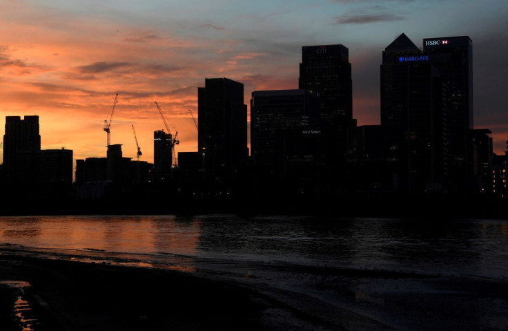 The Canary Wharf business district is seen at dusk in London, Britain December 11, 2016.
