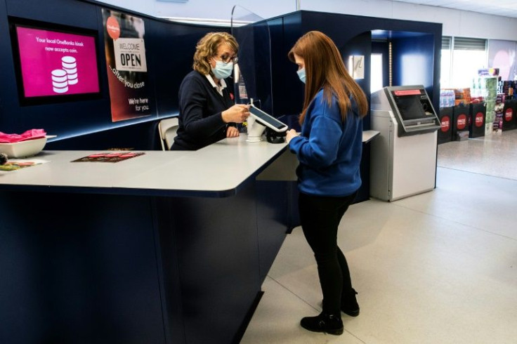 OneBanks offers Denny's 8,000 inhabitants an alternative to traditional bank branches after the rise of online banking allowed lenders battered by the global financial crisis more than a decade ago to save costs by permanently closing outlets