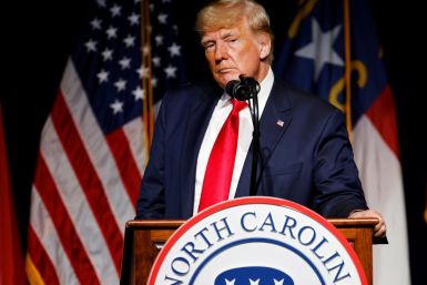 Former U.S. President Donald Trump pauses while speaking at the North Carolina GOP convention dinner in Greenville, North Carolina, U.S. June 5, 2021.  