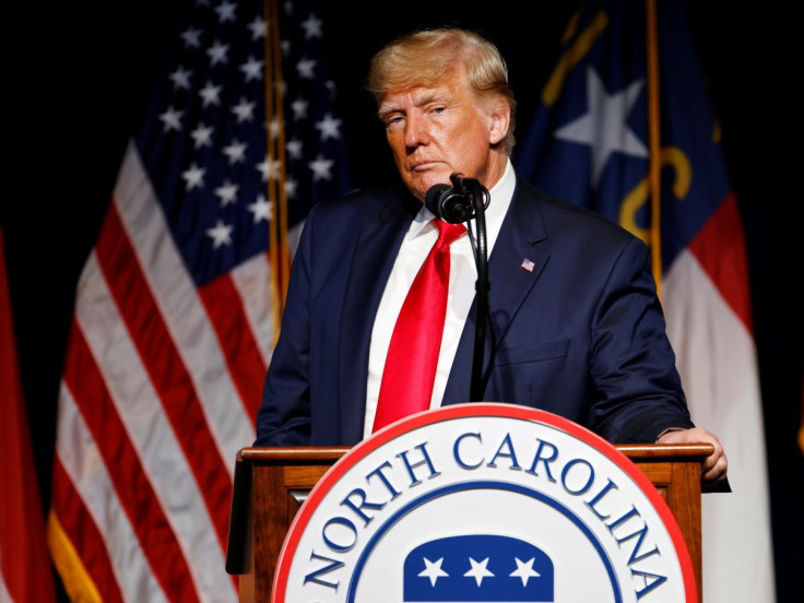 Former U.S. President Donald Trump pauses while speaking at the North Carolina GOP convention dinner in Greenville, North Carolina, U.S. June 5, 2021.  