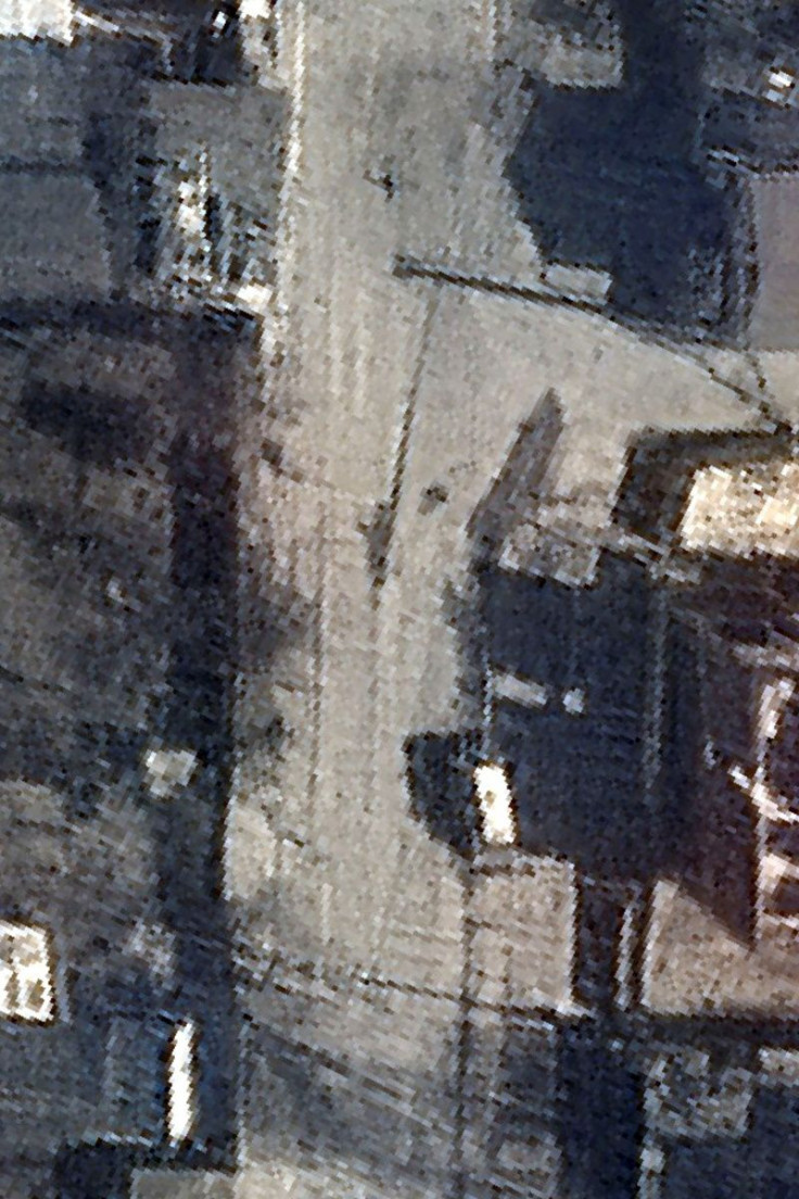 A satellite image shows dead bodies on Yablonska Street in Bucha, Ukraine, March 19, 2022. Picture taken March 19, 2022. Satellite image 2022 Maxar Technologies/Handout via REUTERS ATTENTION EDITORS - THIS IMAGE HAS BEEN SUPPLIED BY A THIRD PARTY. MANDATO