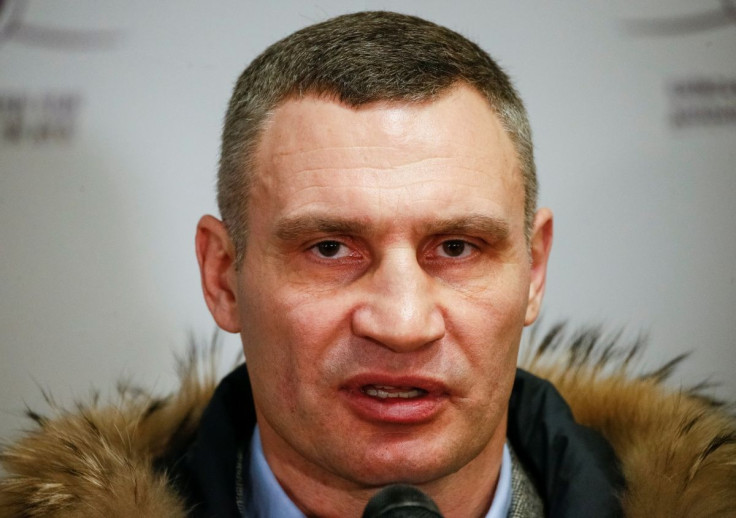 Mayor of Kyiv and former heavyweight boxing champion Vitali Klitschko speaks with journalists during the opening of the first Ukrainian Territorial Defence Forces recruitment centre in central Kyiv, Ukraine, February 2, 2022.