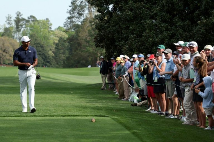 Fans line the ninth tee box to watch US superstar Tiger Woods during a practice round prior to the Masters at Augusta National