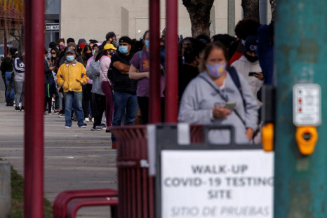 People wait outside a community center as long lines continue for individuals trying to be tested for COVID-19 during the outbreak of the coronavirus disease (COVID-19) in San Diego, California, U.S., January 10, 2022. 