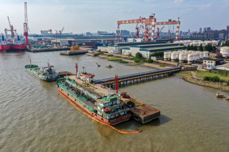 Oil tankers are seen at a terminal of Sinopec Yaogang oil depot in Nantong, Jiangsu province, China June 11, 2019. 
