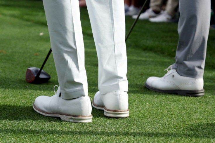Shoe story: A detail of the shoes Tiger Woods is wearing to provide stability to his surgically repaired right leg at the Masters