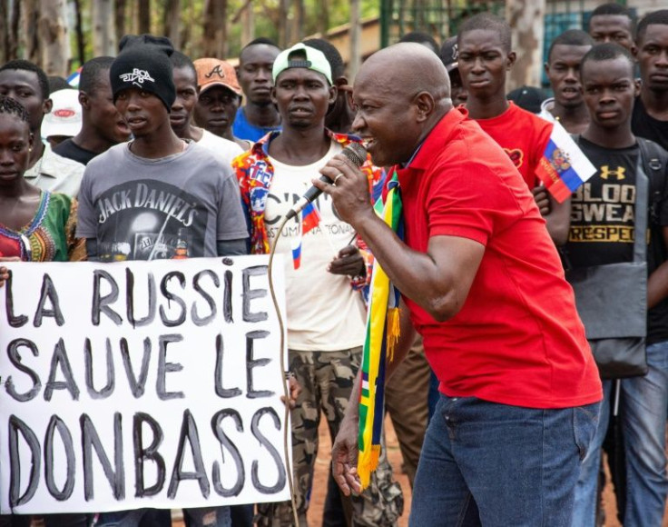 'Russia is saving the Donbas,' says this placard at a pro-Russian rally in the Central African Republic. About a hundred people turned out for the demo in Bangui on March 5