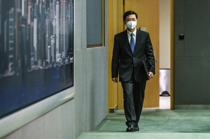 Hong Kong Chief Secretary for Administration John Lee arrives for a news conference in Hong Kong, China, April 6, 2022. Lam Yik/Pool via REUTERS