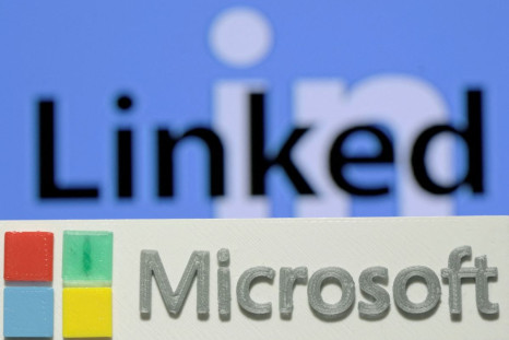 A 3D-printed logo of Microsoft is seen in front of a displayed LinkedIn logo in this illustration taken June 13, 2016. 