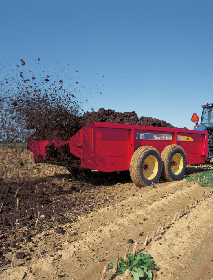 A New Holland Agriculture 100 series box spreader distributes solid manure on a farm field in Rising Sun, Maryland, U.S., in this undated handout photo. CNH Industrial/Handout via REUTERS       