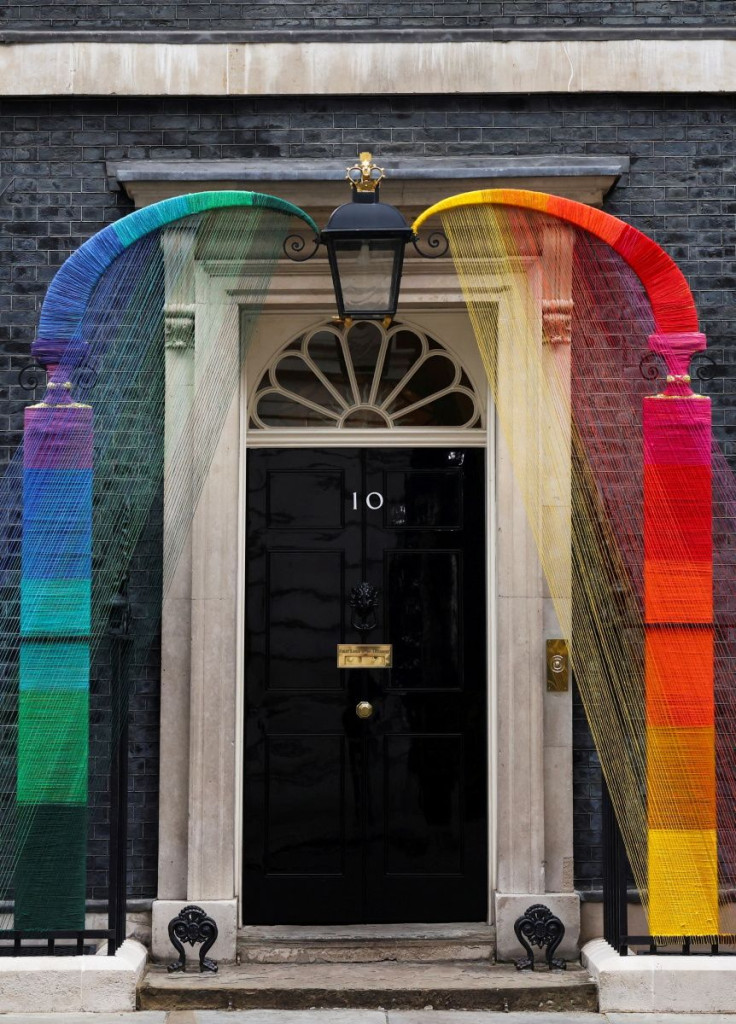A rainbow arch by Artists Louisa Loizeau and Hattie Newman is installed over the door at Number 10 Downing Street to mark Pride month, in London, Britain, June 29, 2021. 
