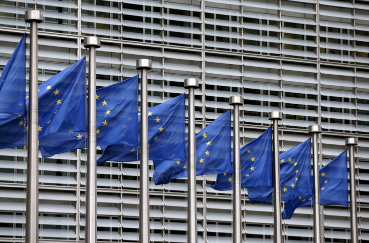 European Union flags flutter outside the EU Commission headquarters in Brussels, Belgium, in this file picture taken October 28, 2015. 