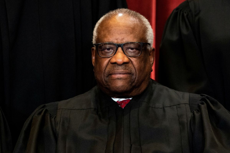 Associate Justice Clarence Thomas poses during a group photo of the Justices at the Supreme Court in Washington, U.S., April 23, 2021. Erin Schaff/Pool via 