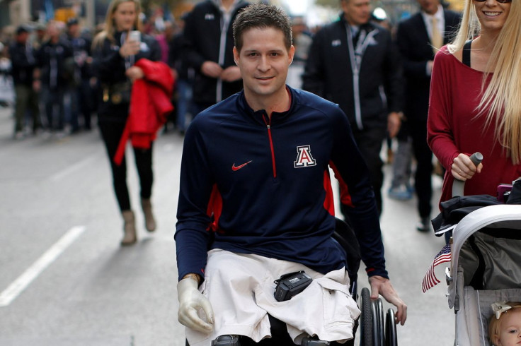 United States Air Force Senior Airman Brian Kolfage Jr., a triple amputee who lost both his legs and an arm while serving his second deployment in Iraq in 2004, attends the Veterans Day parade on 5th Avenue in New York, U.S., November 11, 2014.