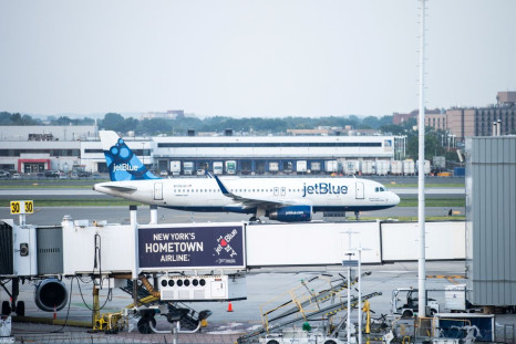 A JetBlue aeroplane is seen at JFK International Airport in the Queens borough of New York City, New York, U.S., August 11, 2021. 