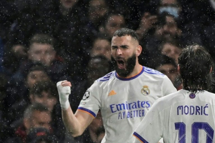 Real Madrid striker Karim Benzema celebrates after scoring against Chelsea