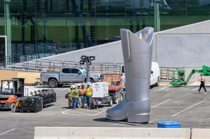 A super-sized cowboy boot arrives onsite at the new Tesla Giga Texas factory in Austin
