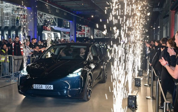 A Model Y electric vehicle drives off the production line at Tesla's "Gigafactory" in Berlin, Germany