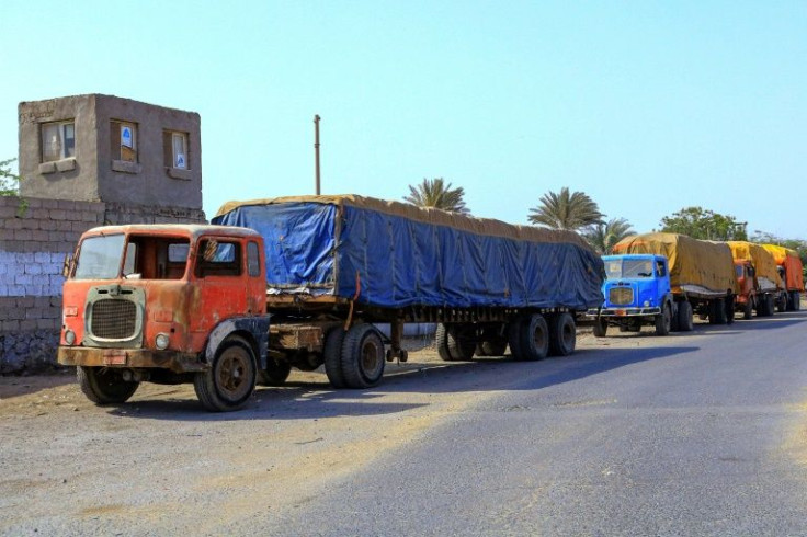 Trucks leave Yemen's rebel-held port of Hodeida on Tuesday with desperately needed food supplies after the Saudi-led coalition eases its naval blockade as part of a fragile ceasefire
