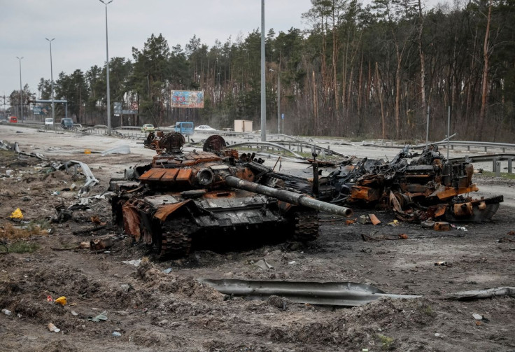 A destroyed Russian tank is seen on a highway, as Russia's attack on Ukraine continues, in Kyiv region, Ukraine, April 5, 2022. 