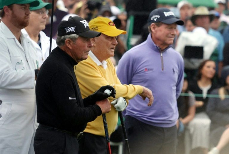 Honorary starters and Masters champions Gary Player of South Africa, Jack Nicklaus, and Tom Watson look on from the first tee