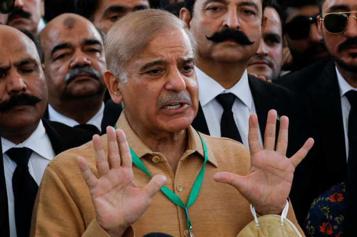 Leader of the opposition Mian Muhammad Shehbaz Sherif, brother of ex-Prime Minister Nawaz Sharif, gestures as he speaks to the media at the Supreme Court of Pakistan in Islamabad, Pakistan April 7, 2022. 