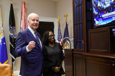 U.S. President Joe Biden and Supreme Court nominee Judge Ketanji Brown Jackson watch as the full U.S. Senate votes to confirm Jackson as the first Black woman to serve on the U.S. Supreme Court, from the Roosevelt Room at the White House in Washington, U.