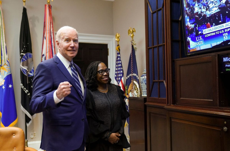 U.S. President Joe Biden and Supreme Court nominee Judge Ketanji Brown Jackson watch as the full U.S. Senate votes to confirm Jackson as the first Black woman to serve on the U.S. Supreme Court, from the Roosevelt Room at the White House in Washington, U.