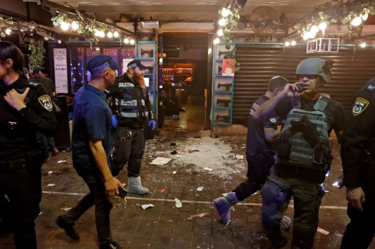 Israeli police arrive at the aftermath of a shooting attack in Dizengoff Street in the centre of Tel Aviv -- at least two people were killed, a hospital statement said