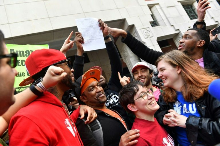 Organized labor backers celebrate following the April 1, 2022 vote to unionize the Amazon Staten Island warehouse in New York