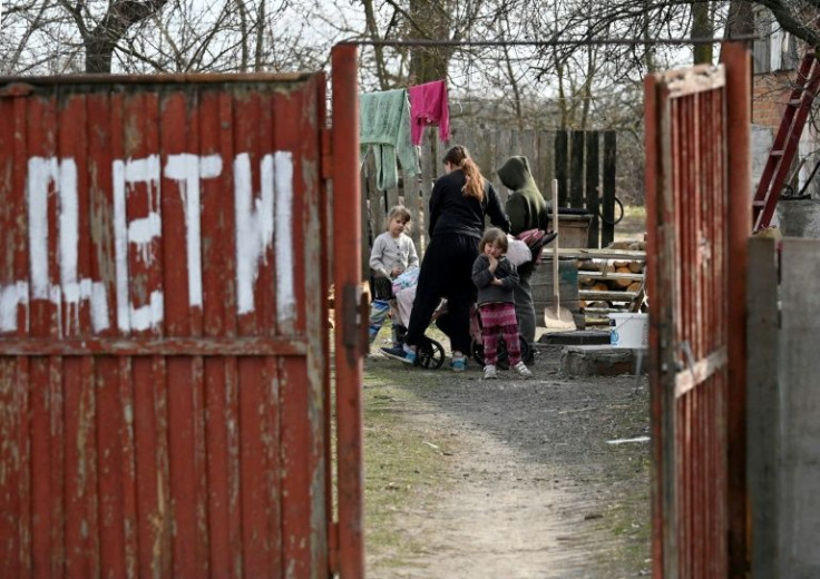 Yulia Piankova's boundary wall has 'children' daubed on it in Russian