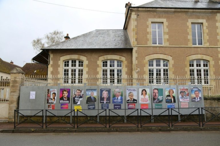 Election posters outside a polling station in Donzy, the French village with the knack of always picking the winner