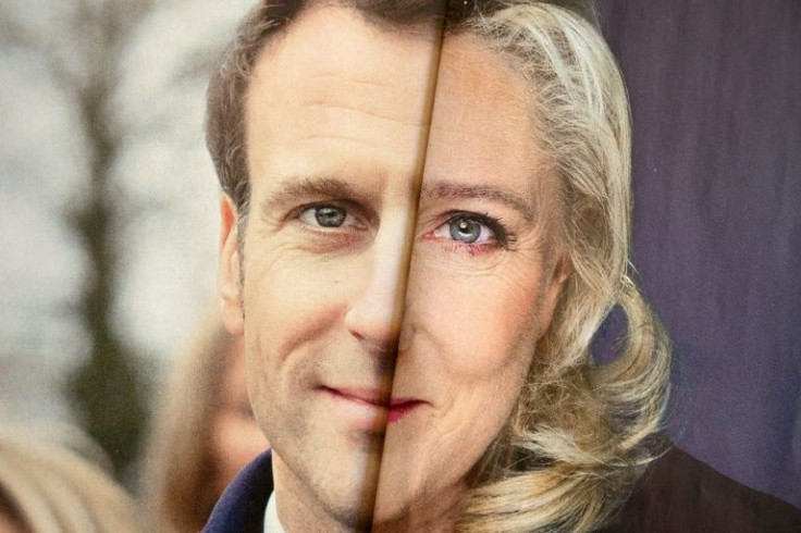 Face to face: Elections leaflets for French President Emmnanuel Macron (L) and his far-right challenger Marine Le Pen