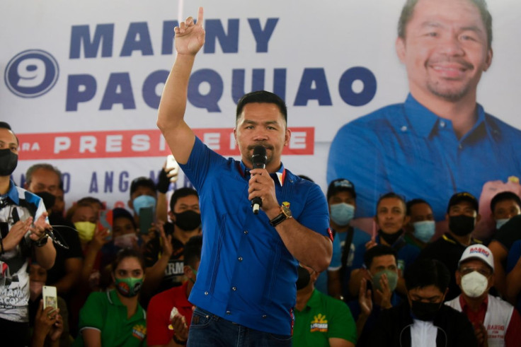 Philippine senator and retired boxing icon Manny Pacquiao, a presidential candidate for the 2022 election, gestures during his campaign rally at a covered court in Rodriguez, Rizal Province, Philippines, February 17, 2022. 
