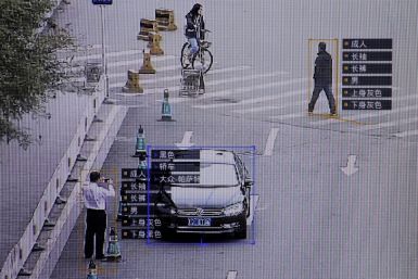 SenseTime surveillance software, which identifies details about people and vehicles, runs during a demonstration at the company's office in Beijing, China, October 11, 2017. 