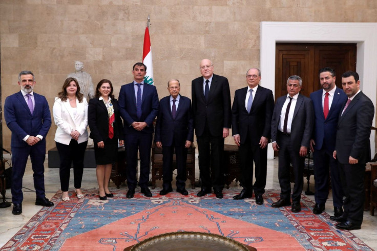 Lebanese President Michel Aoun, Prime Minister Najib Mikati and officials meet with a delegation from the International Monetary Fund at the presidential palace in Baabda, Lebanon April 7, 2022. Dalati Nohra/Handout via 