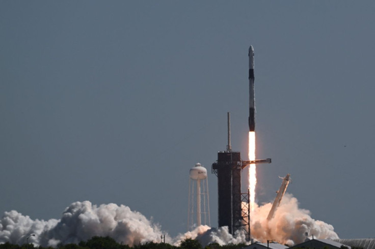 Axiom's four-man team lifts off, riding atop a SpaceX Falcon 9 rocket in the first private astronaut mission to the International Space Station, from NASA's Kennedy Space Center in Cape Canaveral, Florida, U.S. April 8, 2022. 