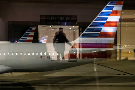 A passenger arrives at a terminal of Ronald Reagan Washington National Airport in Washington, U.S. November 30, 2021. 