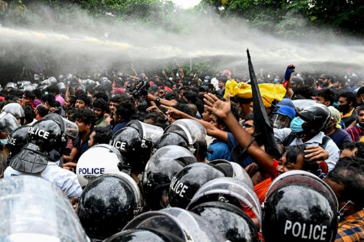 Police in Colombo, Sri Lanka use water cannons to disperse university students protesting near the Parliament building against the country's economic crisis, its worst in decades