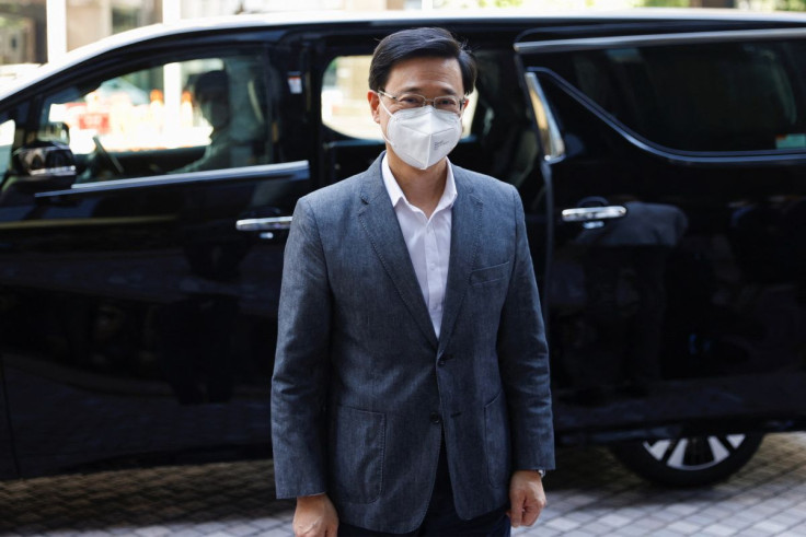Former Hong Kong Chief Secretary for Administration John Lee, arrives at his office after Central People's Government approves his resignation, in Hong Kong, China, April 8, 2022. 