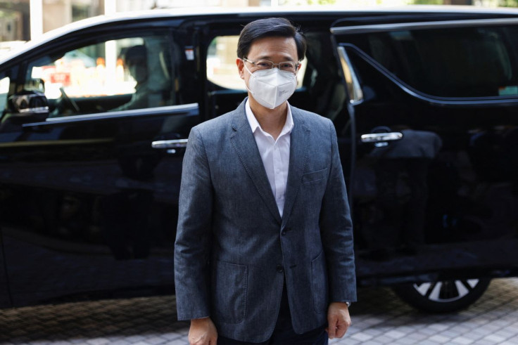 Former Hong Kong Chief Secretary for Administration John Lee, arrives at his office after Central People's Government approves his resignation, in Hong Kong, China, April 8, 2022.