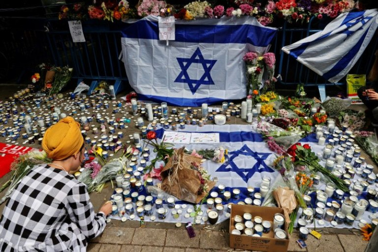 Israelis mourn the three victims of the Tel Aviv attack when an alleged Palestinian gunman went on a shooting spree in a nightlife spot in the coastal city on Thursday night